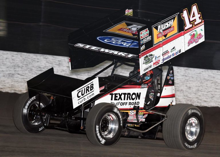 Tony Stewart on the podium during MOWA season opener